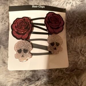 Rose and skull hair clip set.